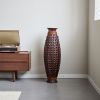 A 39-inch tall hand-woven bamboo floor vase - a decorative highlight for the living room
